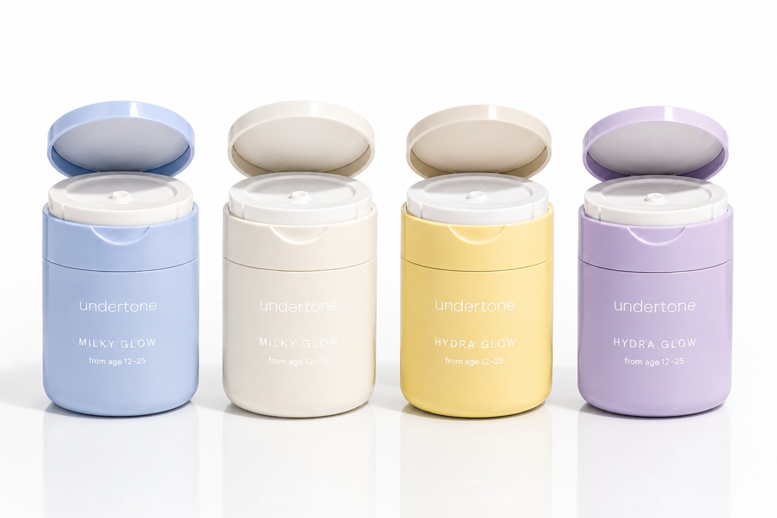 Undertone pastel jars opened, showing blue, cream, yellow and lilac lids